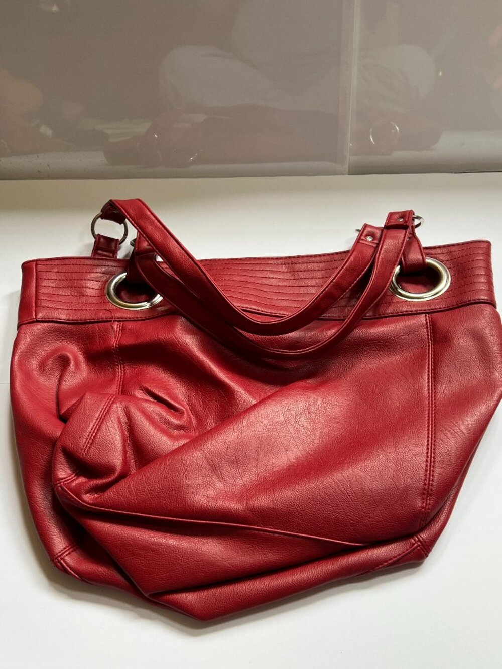 Hobo Bag in Red with blue-striped interior
